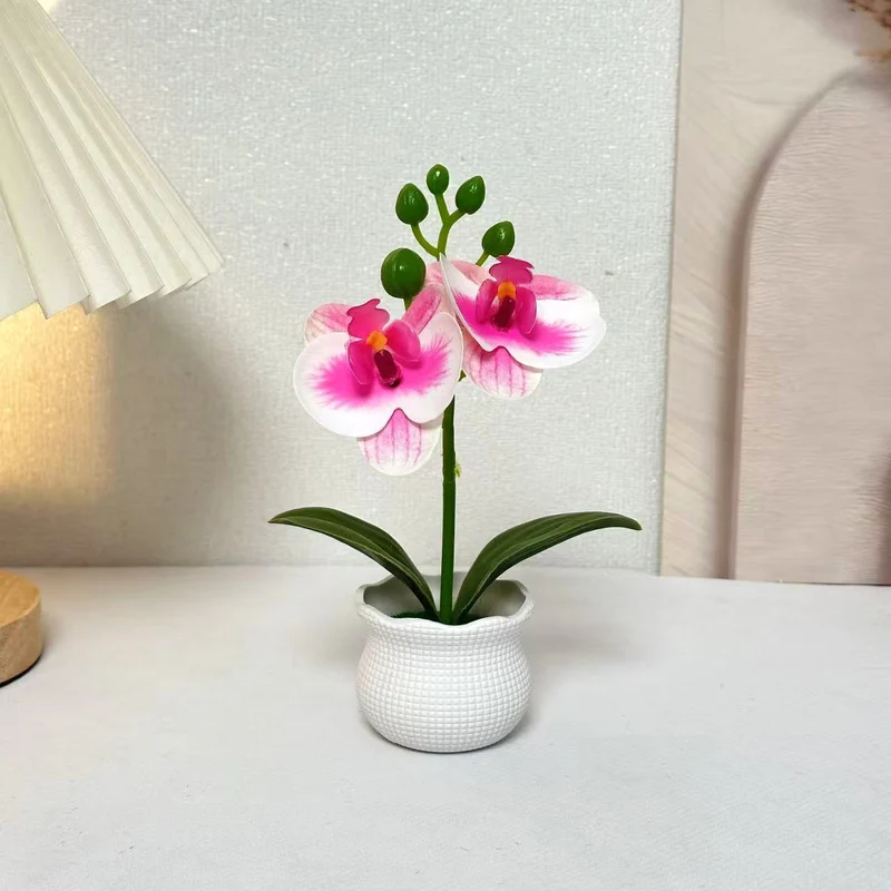 Elegante künstliche Orchideenpflanzenanordnung für die Wohnkultur-Darstellung