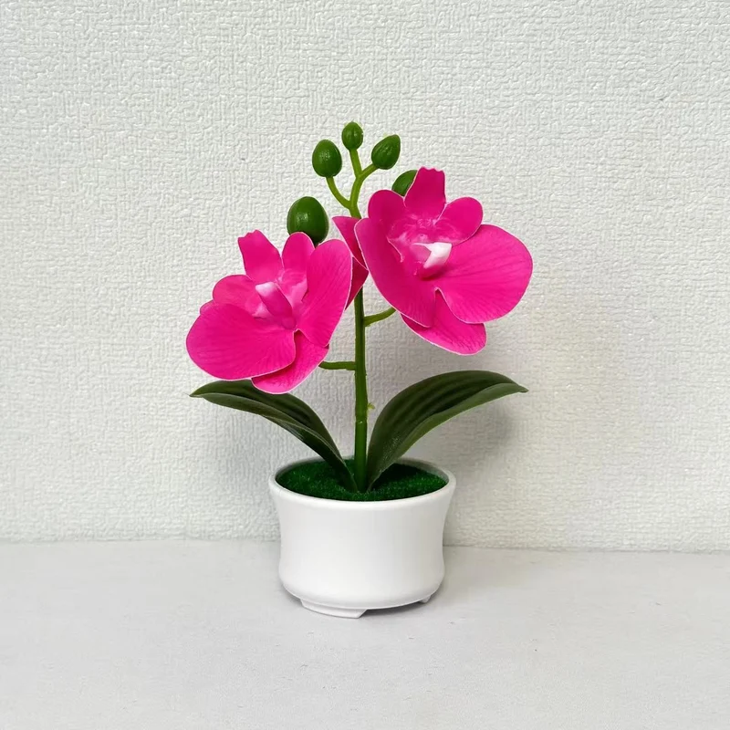 Elegante künstliche Orchideenpflanzenanordnung für die Innendekoration