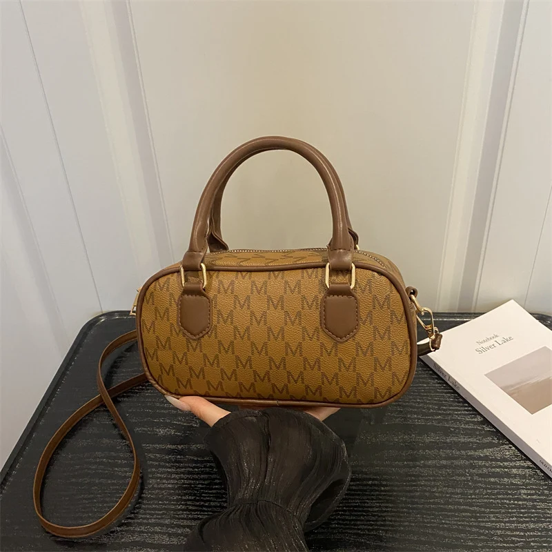 Stylische Monogram-Handtasche