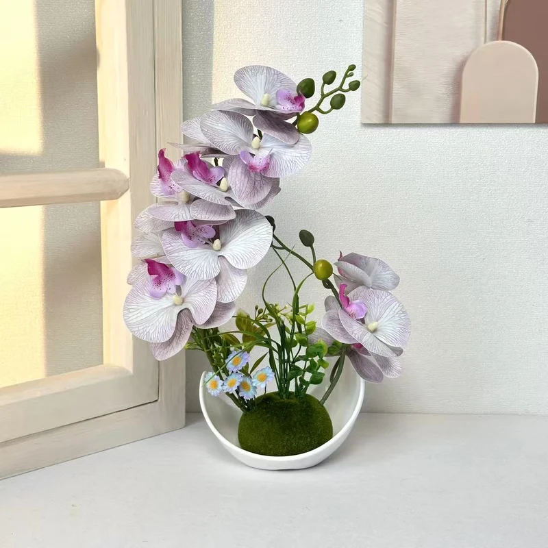Dekorative Orchideenpflanzenanordnung für die Wohnkultur