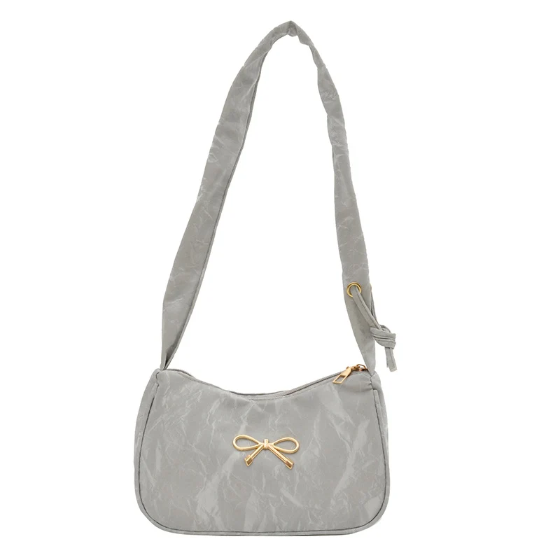 Elegante Schultertasche mit Schleifenverzierung
