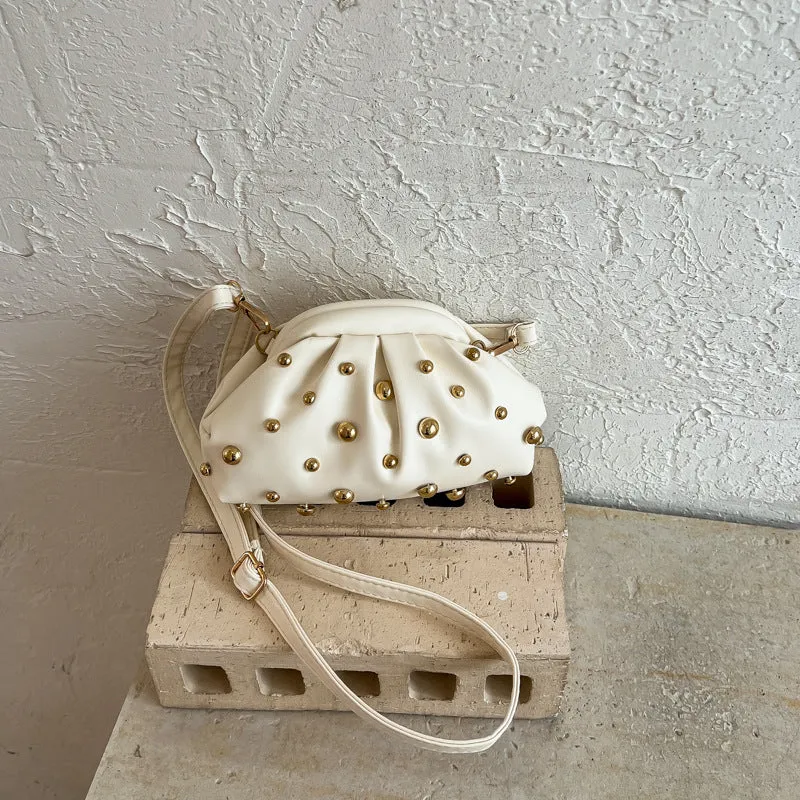 Dekorative Nieten-Clutch Tasche