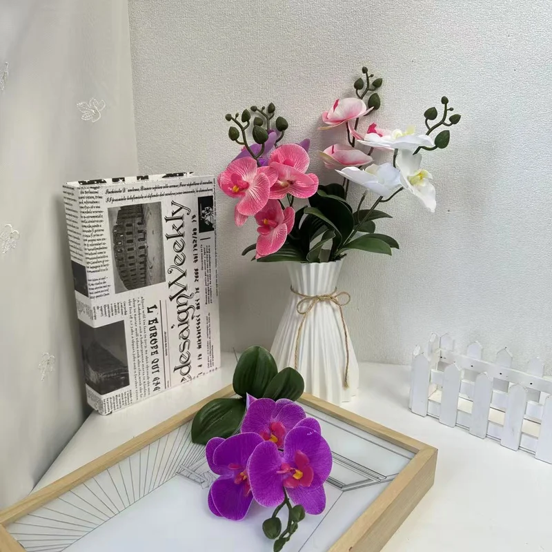 Künstliches Orchideenblütenarrangement für dekorative Wohnraumausstellung