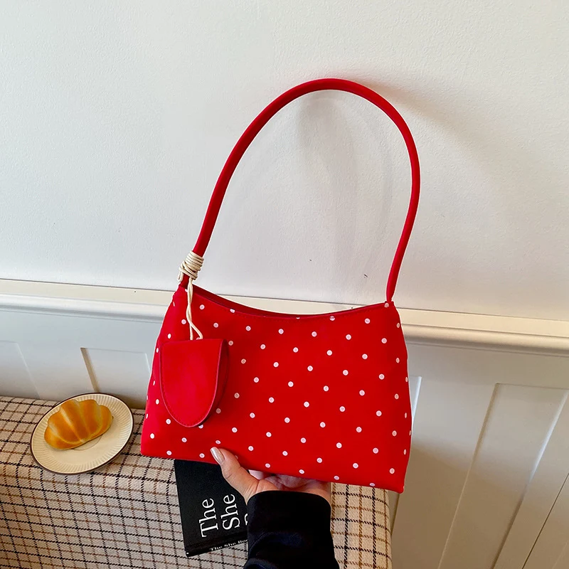 Chice gepunktete Handtasche