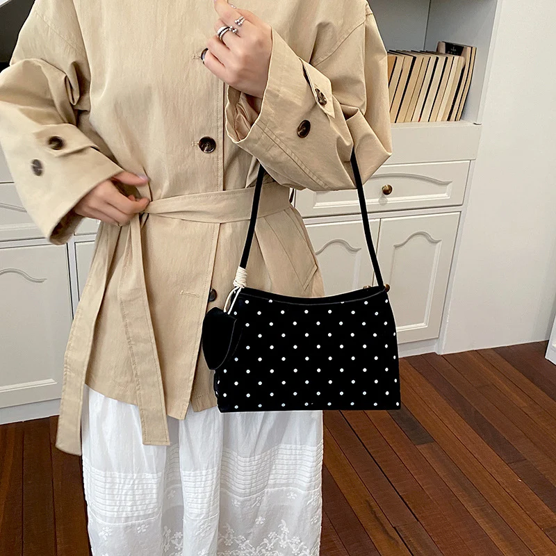 Chice gepunktete Handtasche