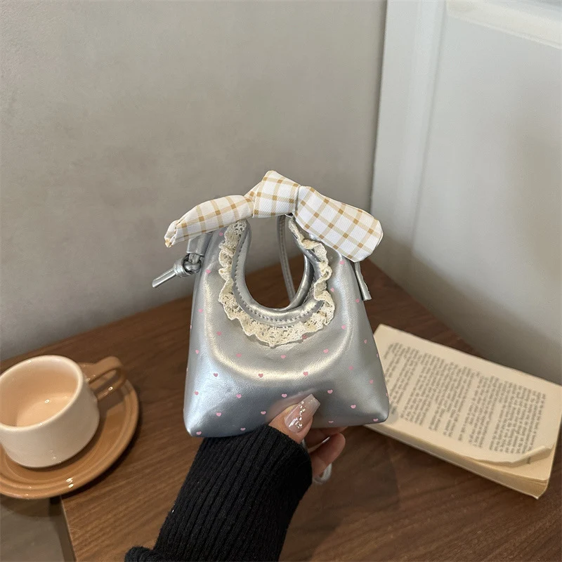 Charmante Mini-Handtasche mit Schleifenakzent