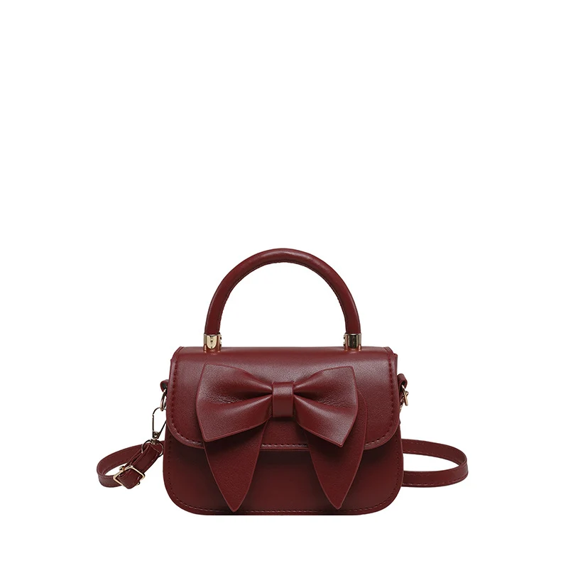 Schultertasche mit Schleifenakzent
