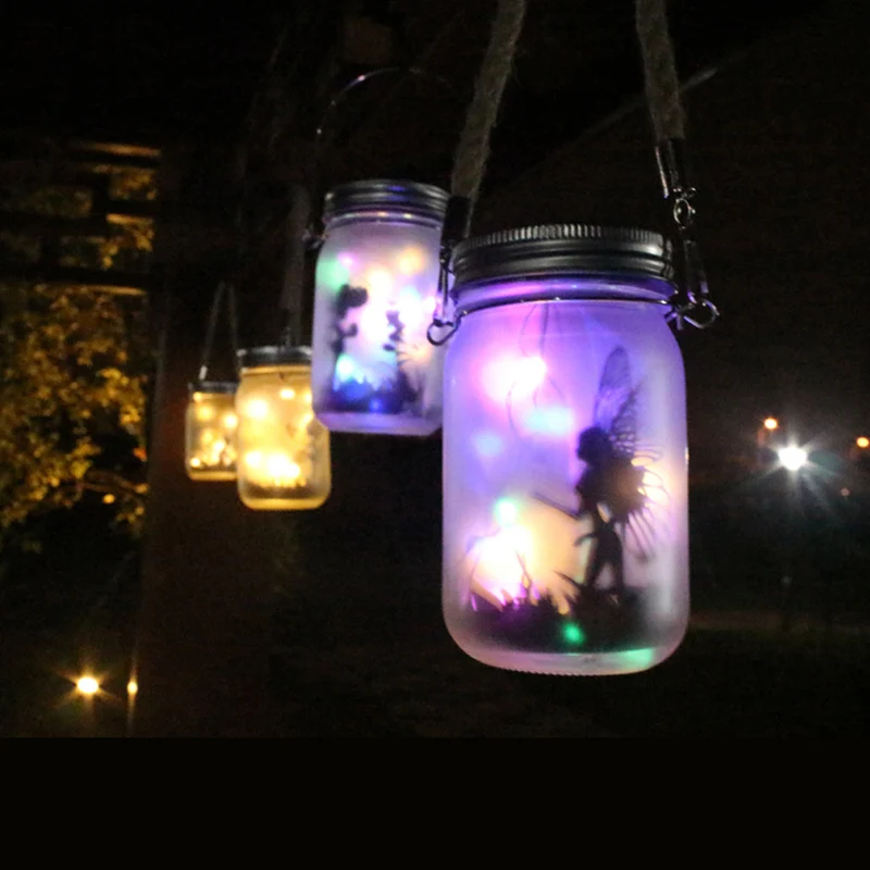 Solarbetriebene Milchglas-Feen-Silhouette-Mason-Jar-Laterne mit mehrfarbiger LED Skanto