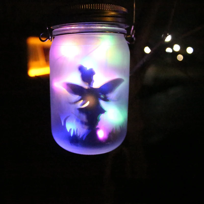 Hängende mattierte Mason Jar Solar-LED-Feen-Silhouette-Laterne mit Seilgriff und dynamischer LED-Lichterkette Skanto