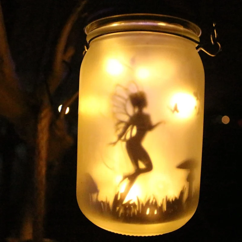 Hängende mattierte Mason Jar Solar-LED-Feen-Silhouette-Laterne mit Seilgriff und dynamischer LED-Lichterkette Skanto