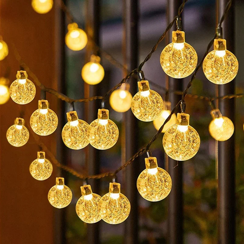 Dekorative warme LED-Stern- und Crackle-Kugel-Lichterkette mit wasserdichtem Netzteil Skanto