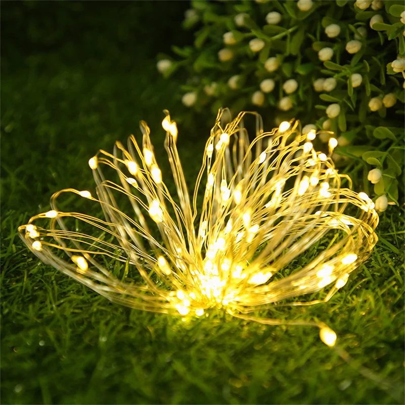 Outdoor Solar Kupferdraht-Lichterkette mit wiederaufladbarer Batteriebox und Erdspieß Skanto