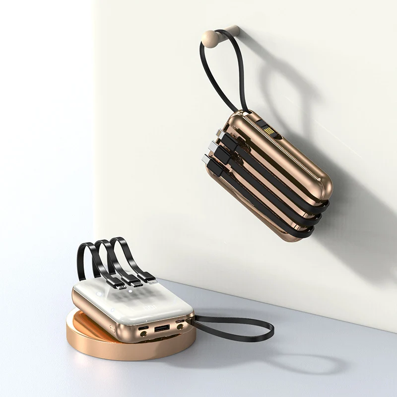 Tragbare Powerbank mit integrierten Ladekabeln und digitaler Ladeanzeige Skanto