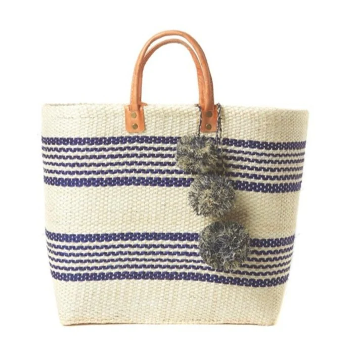 Stylische Strohtasche mit verspielten Pompons Skanto