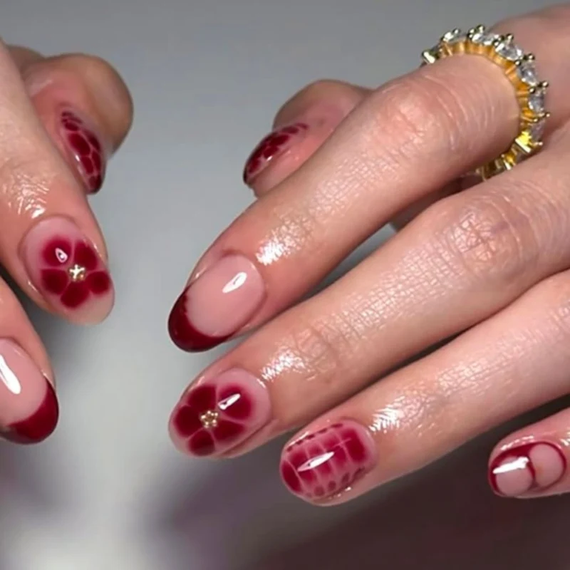Künstlerische Blumennagelverlängerungen