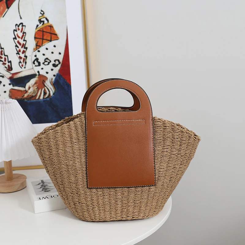 Moderne Korbtasche mit eleganten Lederdetails Skanto