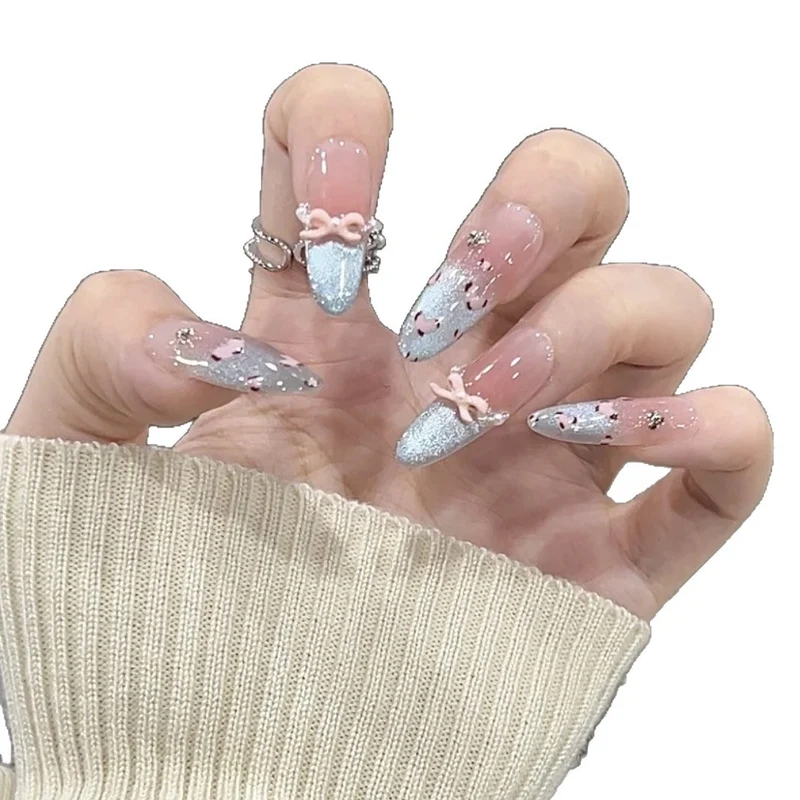 Künstlerisch floral gestaltete Stiletto Press-On Nägel