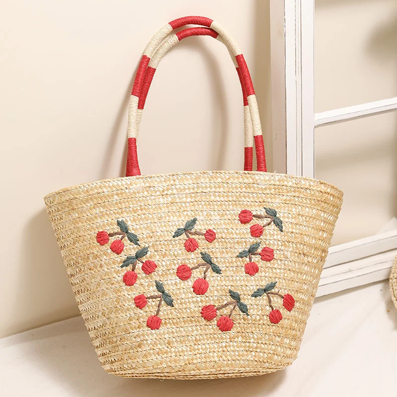 Handgemachte Korbtasche mit lebhaftem Blumenstickerei-Design Skanto