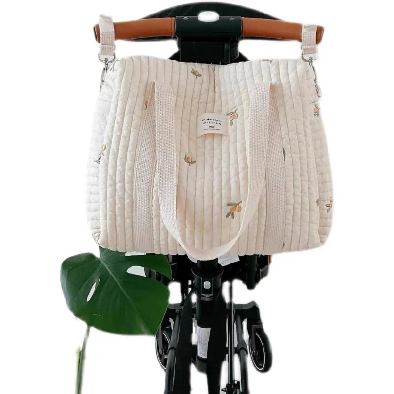 Gestepptes wandelbare Wickelrucksack mit gesticktem Tierapplikation und Kinderwagenhaken