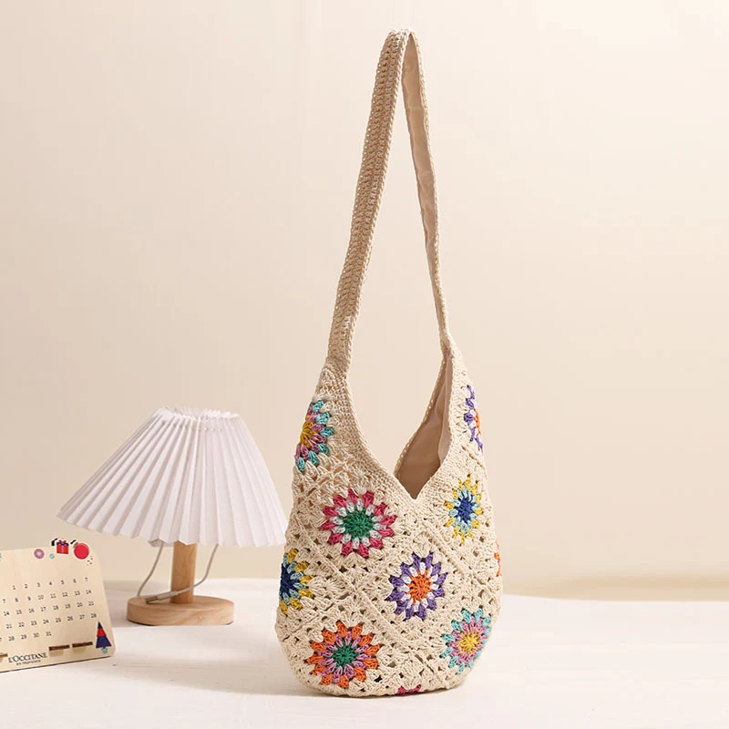 Handgemachte gehäkelte Tasche mit buntem Blumenmuster Skanto