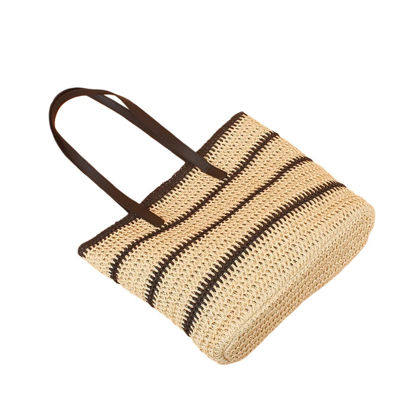 Trendige Strandtasche aus geflochtenem Raffia mit eleganten Ledergriffen Skanto