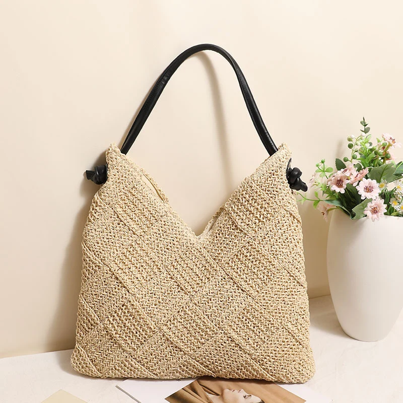 Geflochtene Schultertasche aus Naturmaterialien Skanto