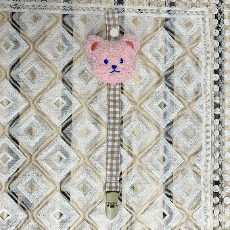 Blumenkleidungs-Schnullerclip mit Gingham-Baumwollgurt