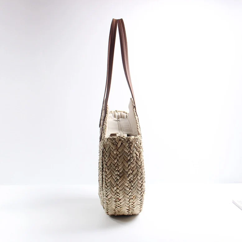 Geflochtene Stroh-Strandtasche mit eleganten Ledergriffen Skanto