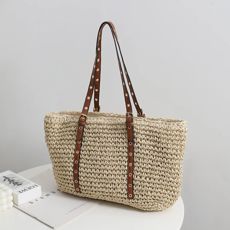 Elegante Korbtasche mit robusten Ledergriffen Skanto