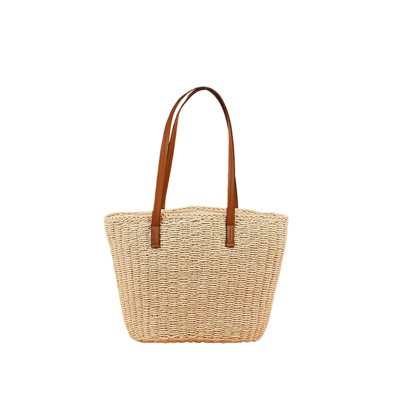 Handtasche aus handgeflochtenem Naturmaterial mit robusten Ledergriffen Skanto