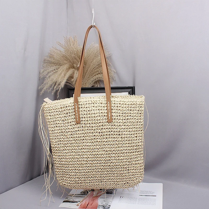 Handgewebte Strandtasche aus Naturmaterial mit Lederdetails Skanto