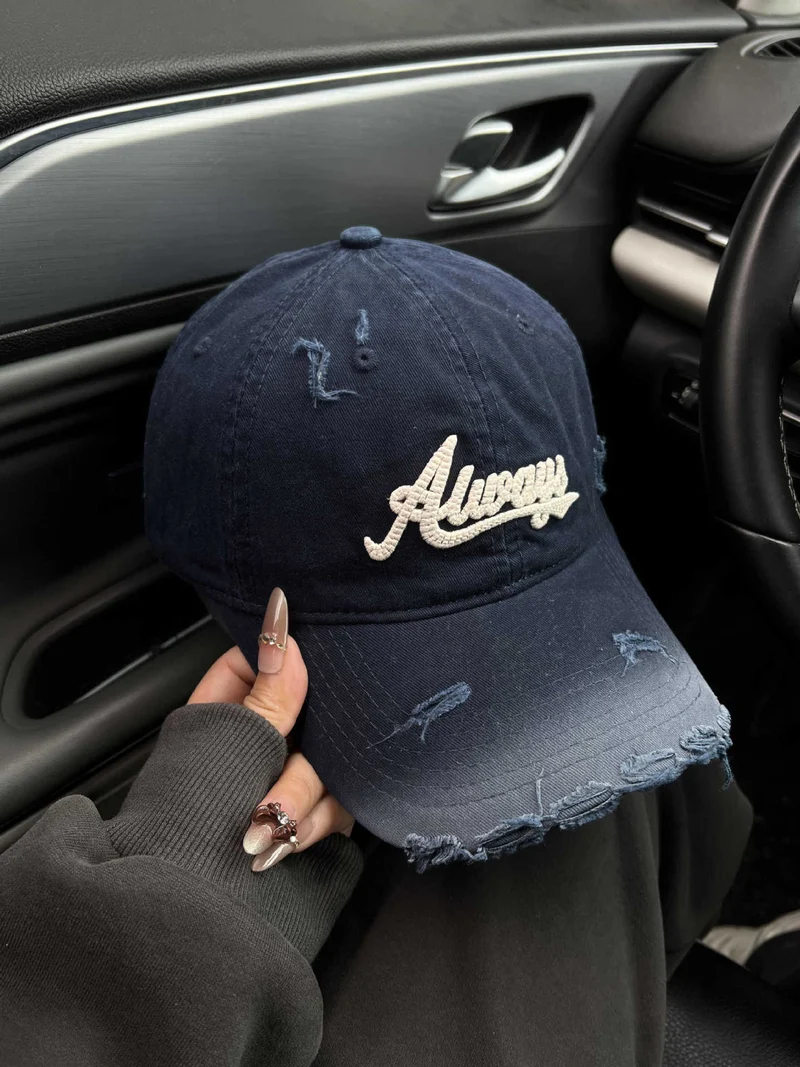 Damen Baseball Cap mit Grafik im Used-Look Skanto