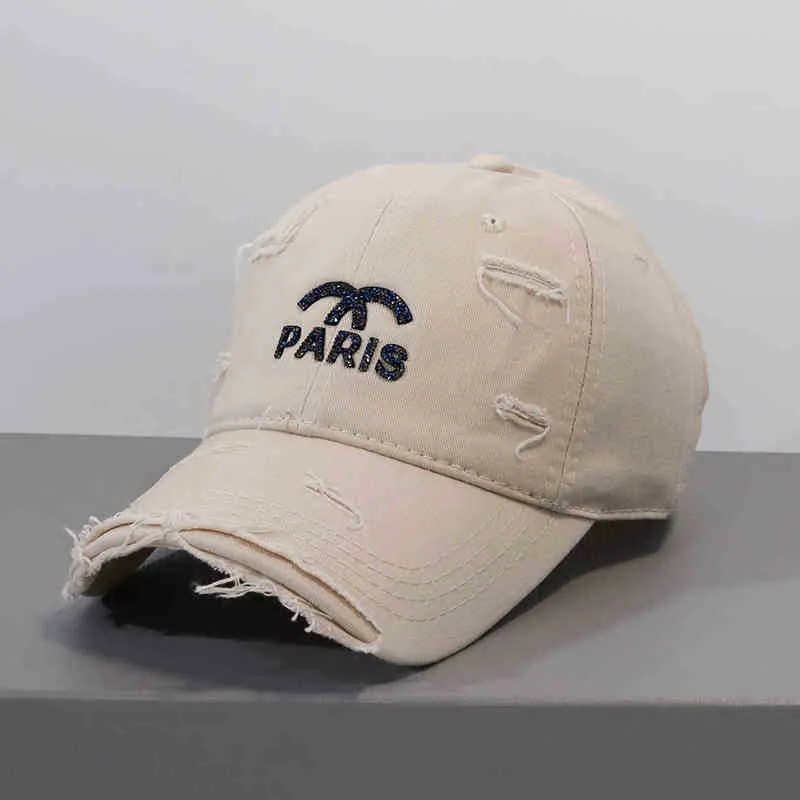 Damen Verstellbare Baseballkappe im Used-Look mit Grafik Skanto