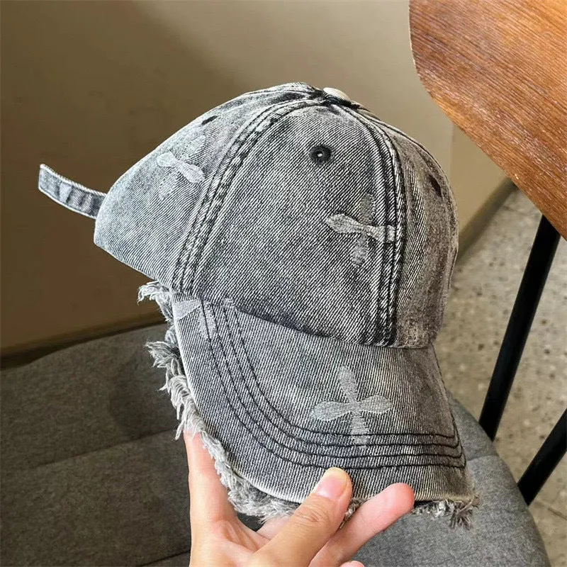 Damen Baseballkappe im Used-Look aus Jeans mit Fransen Skanto