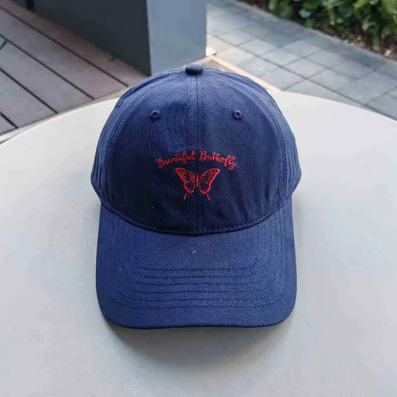 Damen Kappe Skanto mit Schmetterlingsstickerei
