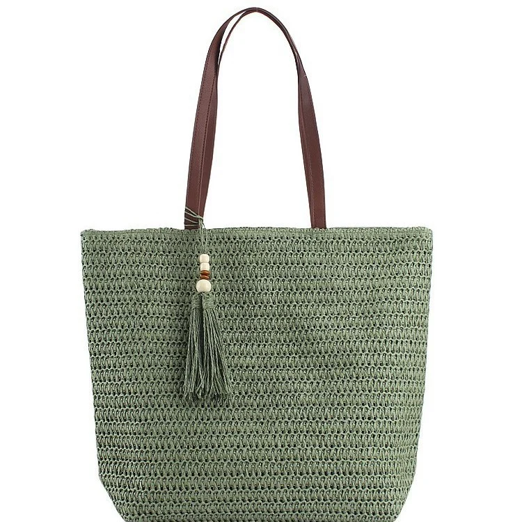 Geräumige Clutch aus geflochtenem Naturmaterial mit dekorativer Quaste Skanto