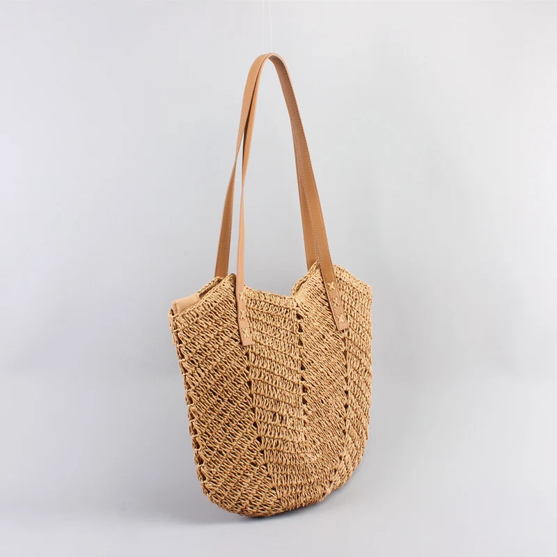 Freizeittaschen aus handgewebtem Raffia mit breiten Ledergriffen Skanto