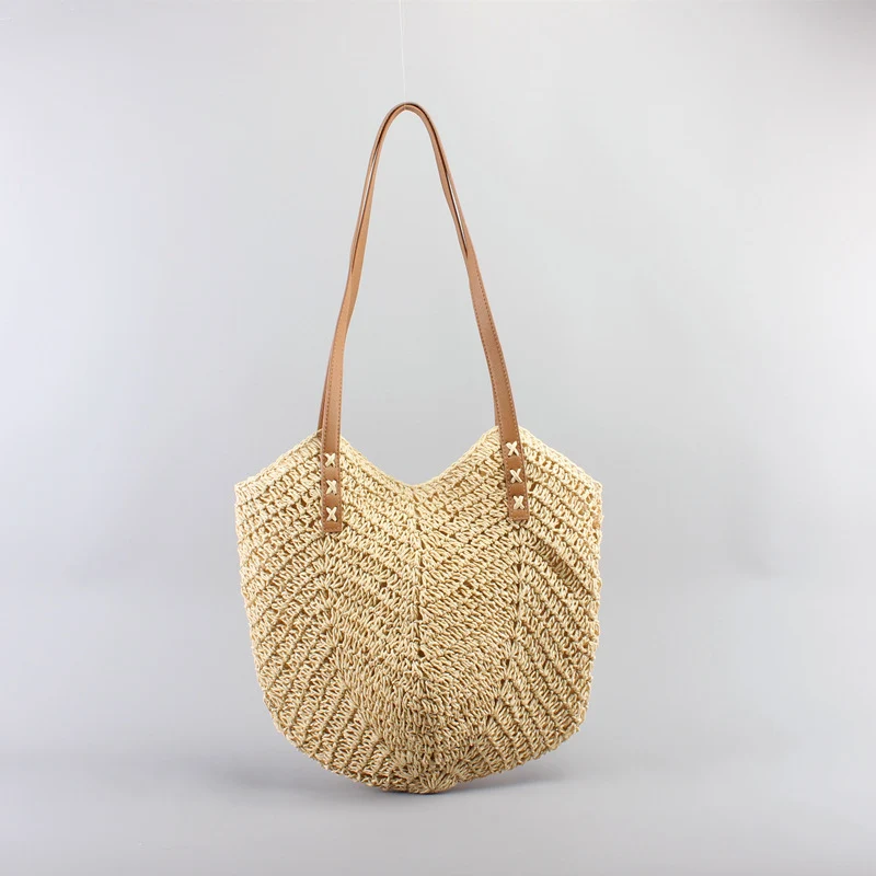 Freizeittaschen aus handgewebtem Raffia mit breiten Ledergriffen Skanto
