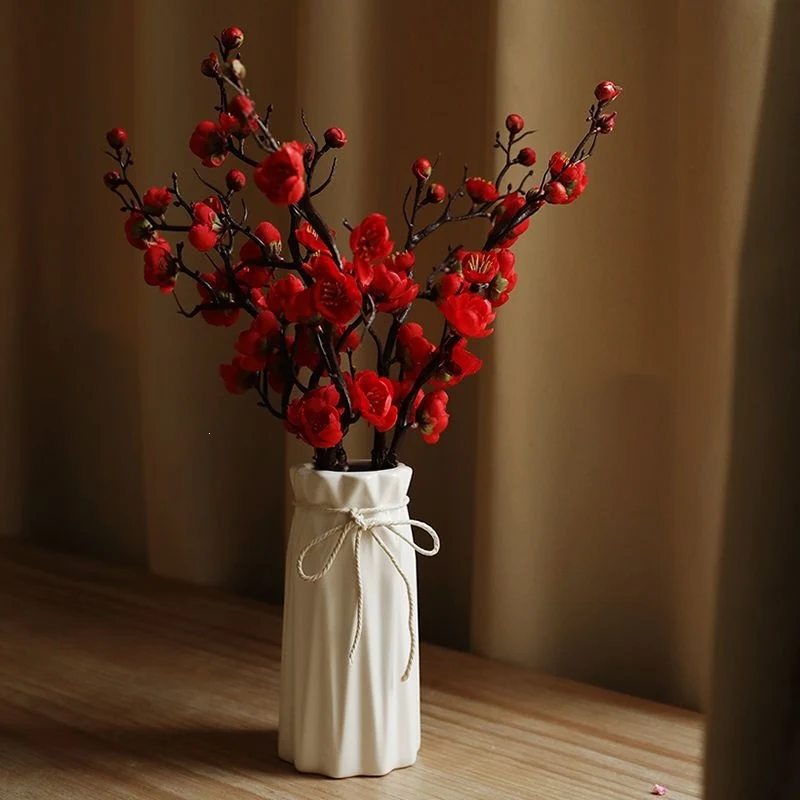 Dekorative Blumenäste Arrangement