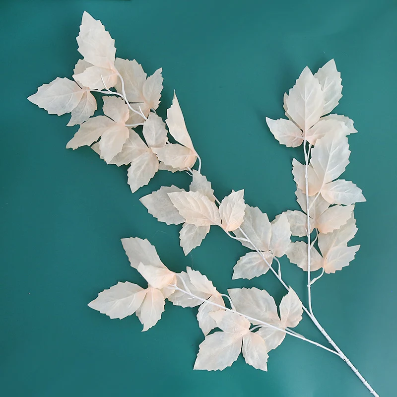Elegante Faux-Blatt-Stamm-Anordnung