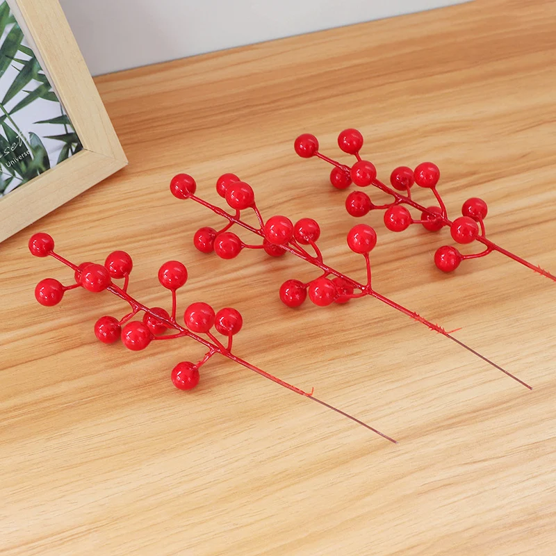Dekorativer Beerenstamm für die Inneneinrichtung