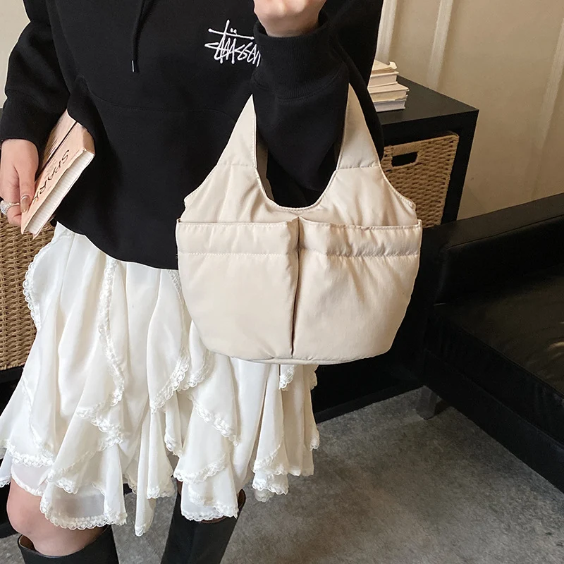 Gepolsterte Utility-Handtasche