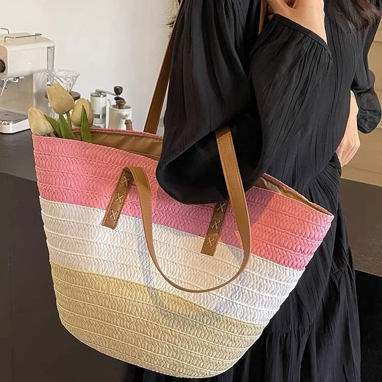 Geflochtene Strandtasche mit robusten Ledergriffen Skanto