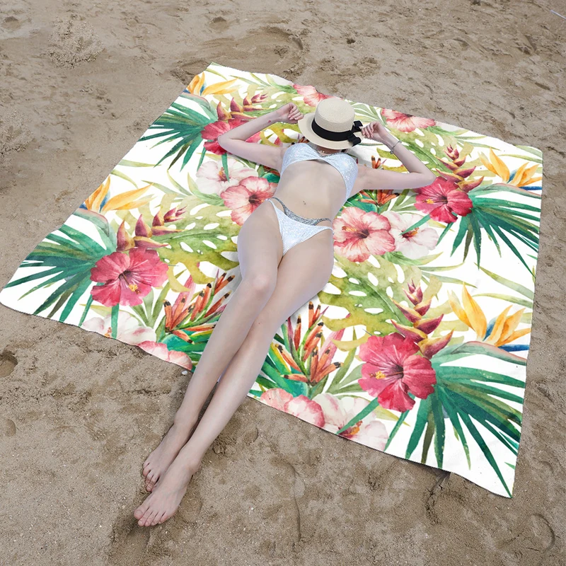 Stranddecke mit lebendigem Blumendesign und innovativer Struktur Skanto