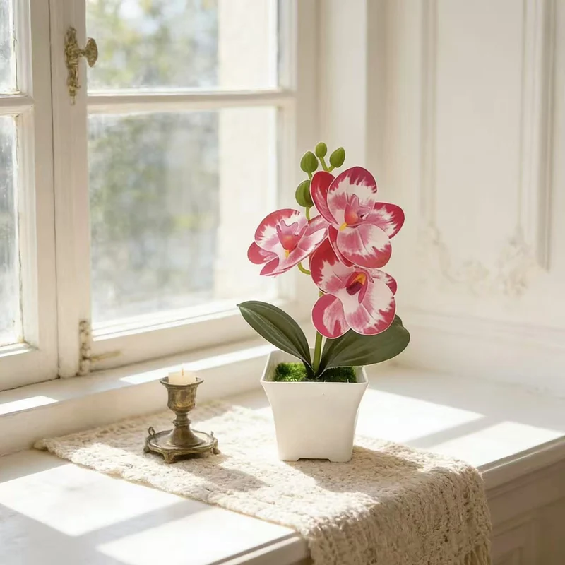 Realistische Künstliche Orchidee in dekorativem Pflanzenpot für Dekoration