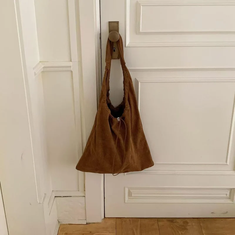 Legere Kordelzug Schultertasche