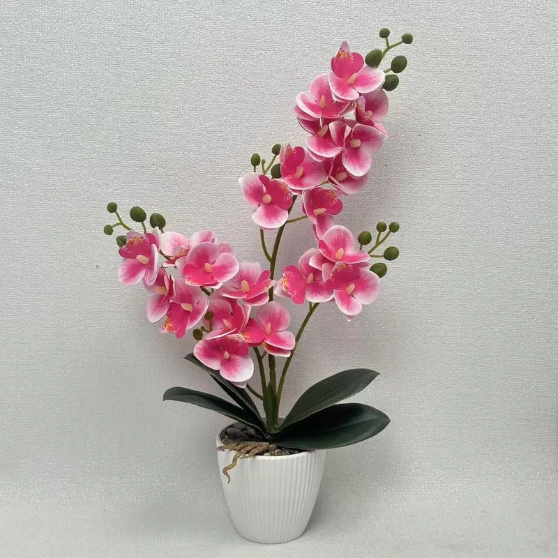 Lebensechte Orchideen Blumengesteck