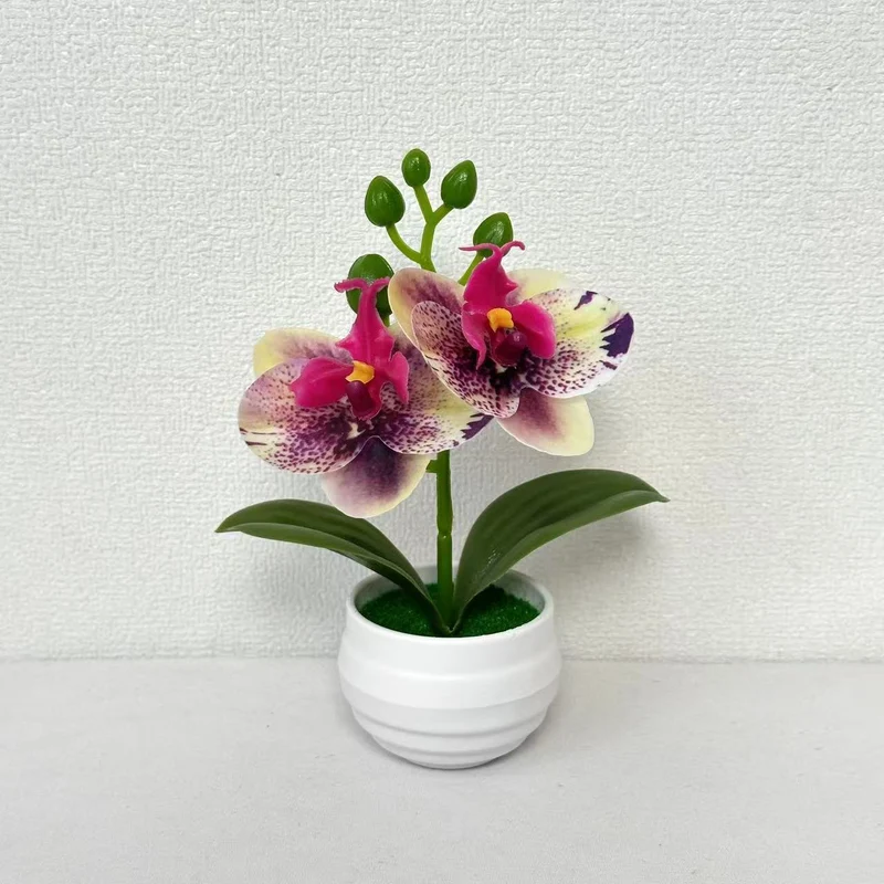 Lebensechte künstliche Orchideenpflanzenanordnung für die Innendekoration