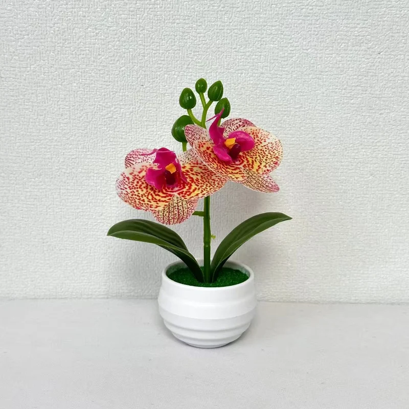 Lebensechte künstliche Orchideenpflanzenanordnung für die Innendekoration