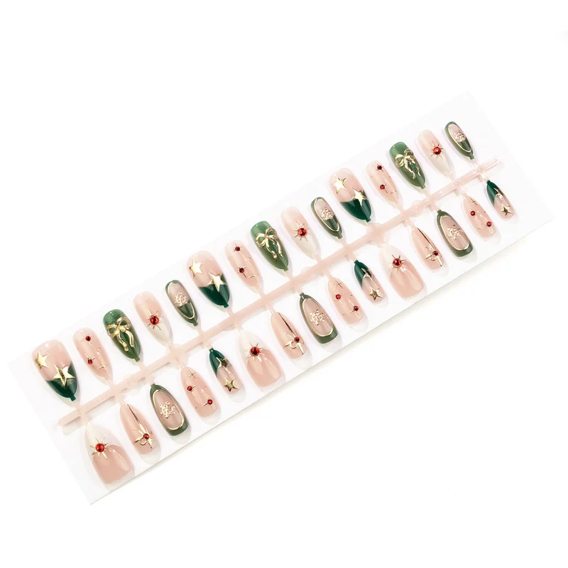 Festliches, thematisches Press-On Nageldesign-Set mit Gold- und Edelsteinelementen Brehn